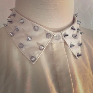 Spike studded collar tank